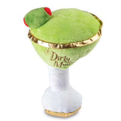 Plush dog toy shaped like a martini glass with a green olive on top, gold trim, and the embroidered words "Dirty Muttini." White stem and gold base, soft squeaky chew toy for pets.