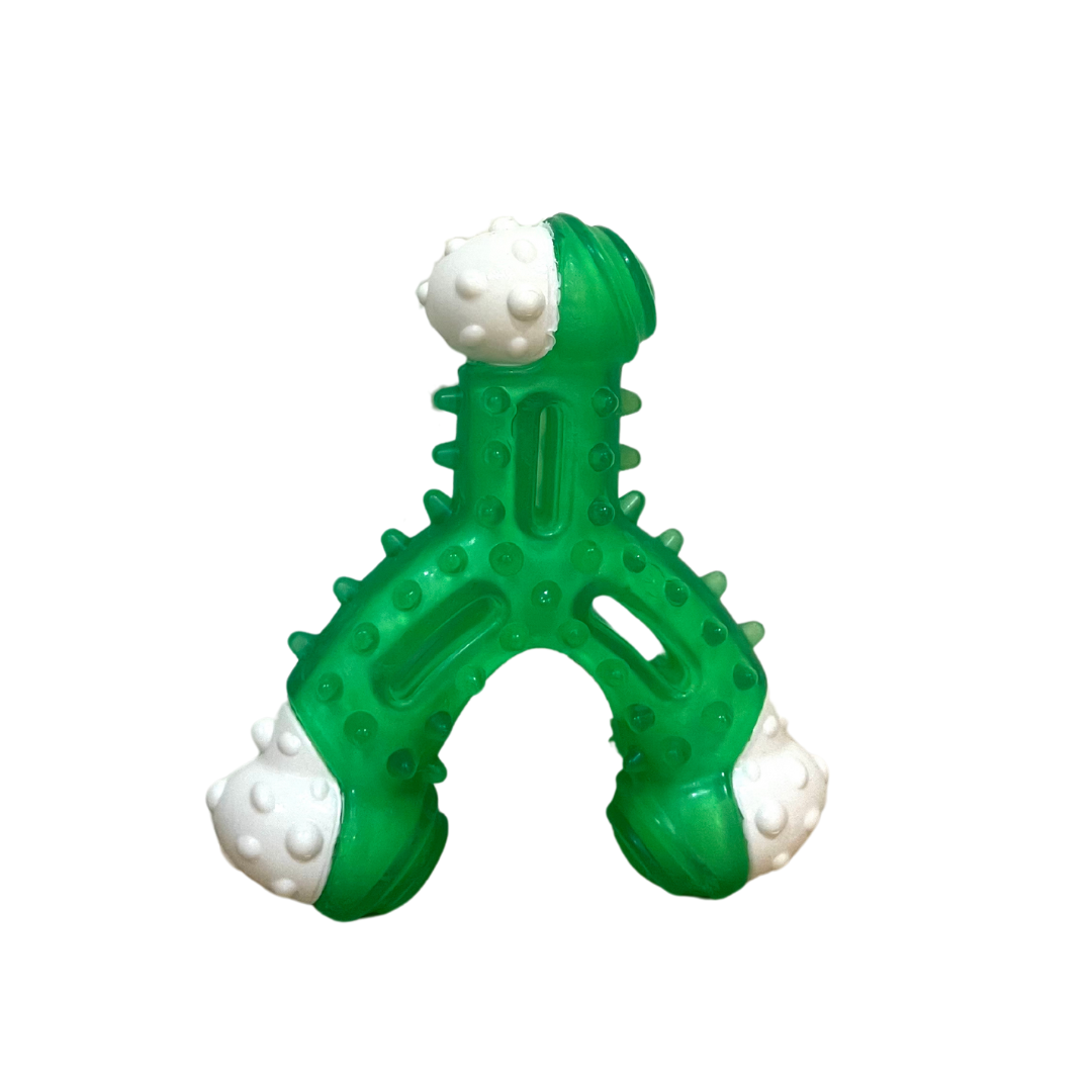 Green and white rubber dog chew toy with three arms and textured bumps for teething and dental cleaning.