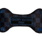 Plush dog bone toy in black and blue check pattern with blue embroidered icons and a “Chewy Vutton Paris” label. Luxury designer-style squeaky chew toy for pets.