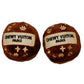 Two brown plush dog balls featuring the Chewy Vuiton Paris logo and gold embroidered symbols, designed as luxury-themed dog toys.