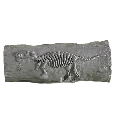 Gray rubber dog chew toy shaped like a tree trunk with textured bark and a raised yellow leaf design. Durable interactive chew toy for pets.