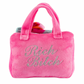 Plush dog toy shaped like a handbag with soft handles and embroidered text “Rich Bitch” on the front. Available in pink and orange colors. Luxury squeaky chew toy for pets.