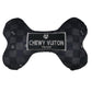 Luxury-inspired Chewy Vuiton black checkered plush dog bone toy with embroidered Paris label.