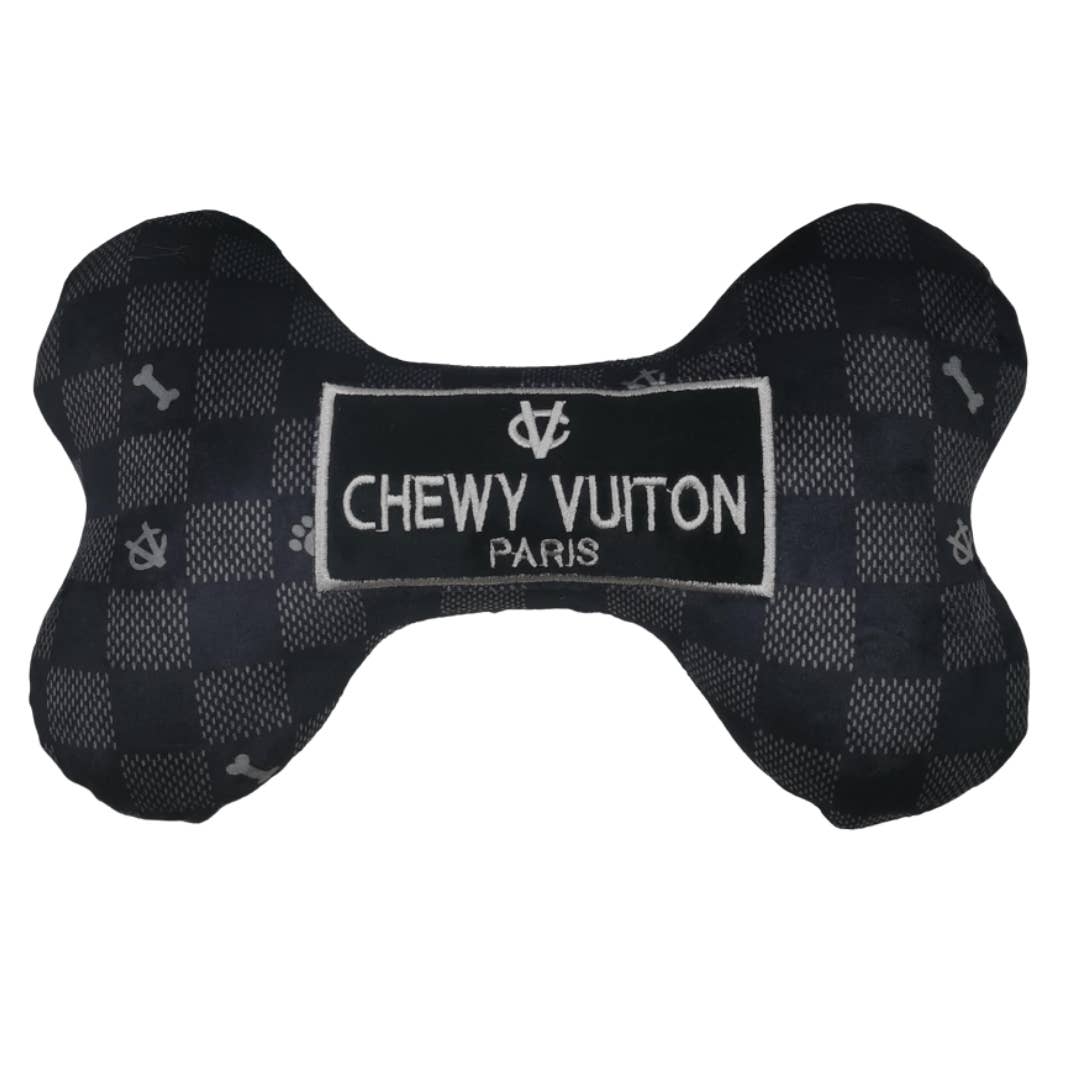 Luxury-inspired Chewy Vuiton black checkered plush dog bone toy with embroidered Paris label.