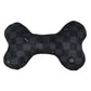 Luxury-inspired Chewy Vuiton black checkered plush dog bone toy with embroidered Paris label.