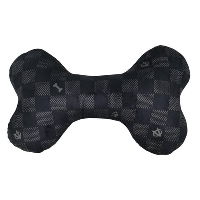 Luxury-inspired Chewy Vuiton black checkered plush dog bone toy with embroidered Paris label.