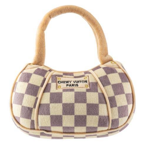 Two plush dog toys designed like Chewy Vuiton Paris handbags, featuring a beige and grey checkered pattern with soft handles, shown in large and small sizes.
