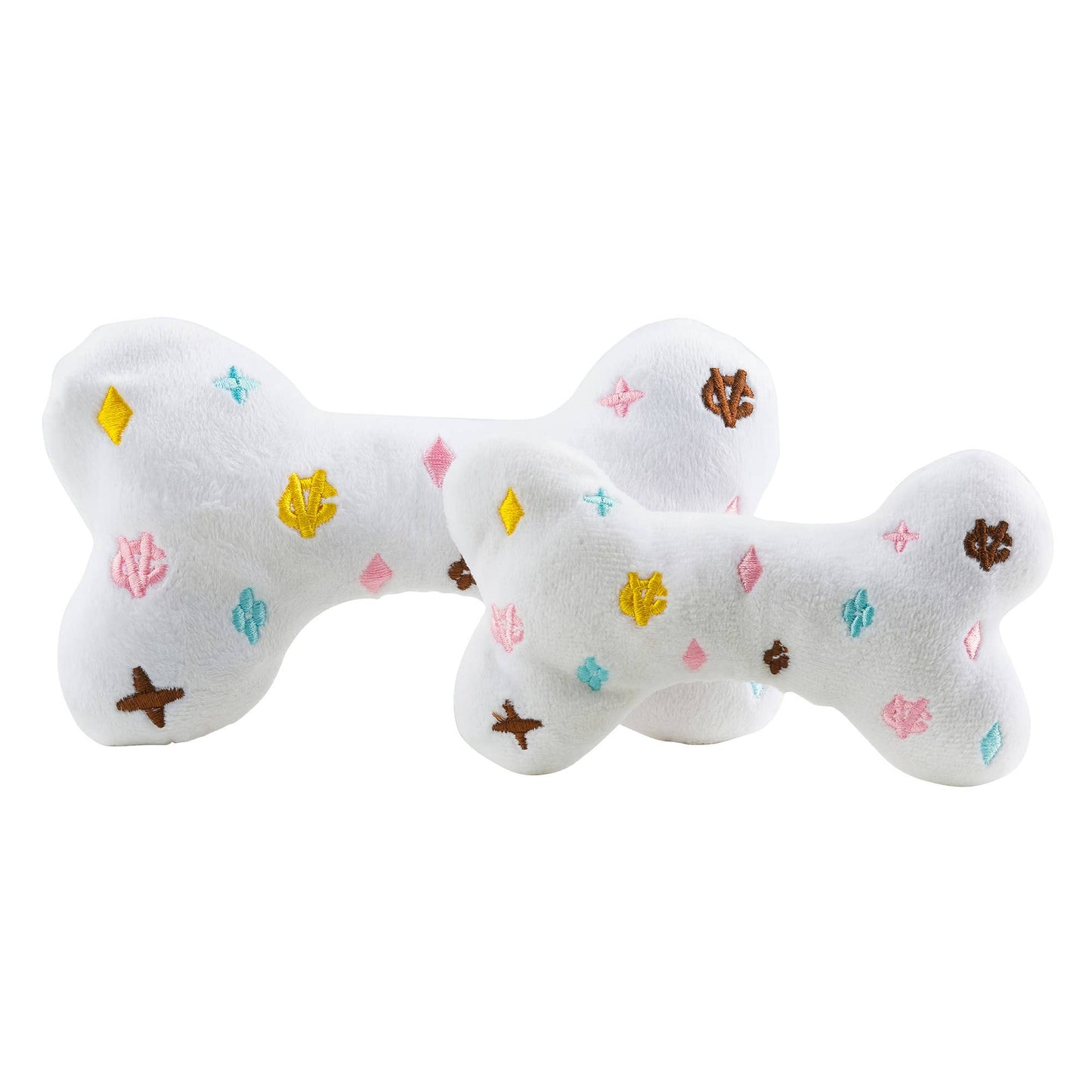 Luxury-inspired white Chewy Vuiton plush dog bone toy with pastel embroidered designer motifs for dogs.