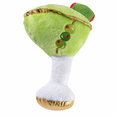 Plush dog toy shaped like a martini glass with a green olive on top, gold trim, and the embroidered words "Dirty Muttini." White stem and gold base, soft squeaky chew toy for pets.