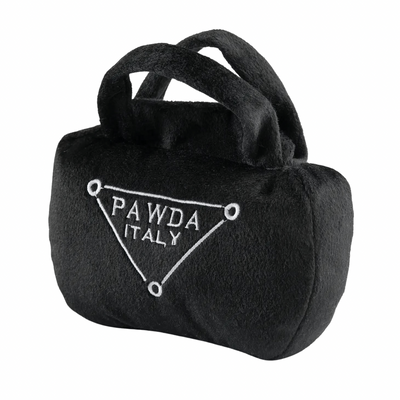 Black plush dog toy shaped like a designer handbag with embroidered “Pawda Italy” triangle logo. Soft luxury squeaky chew toy for pets.
