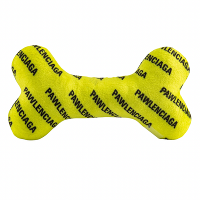 Bright yellow plush dog bone toy with black repeating “Pawlenciaga” text pattern. Soft squeaky designer-style chew toy for pets.