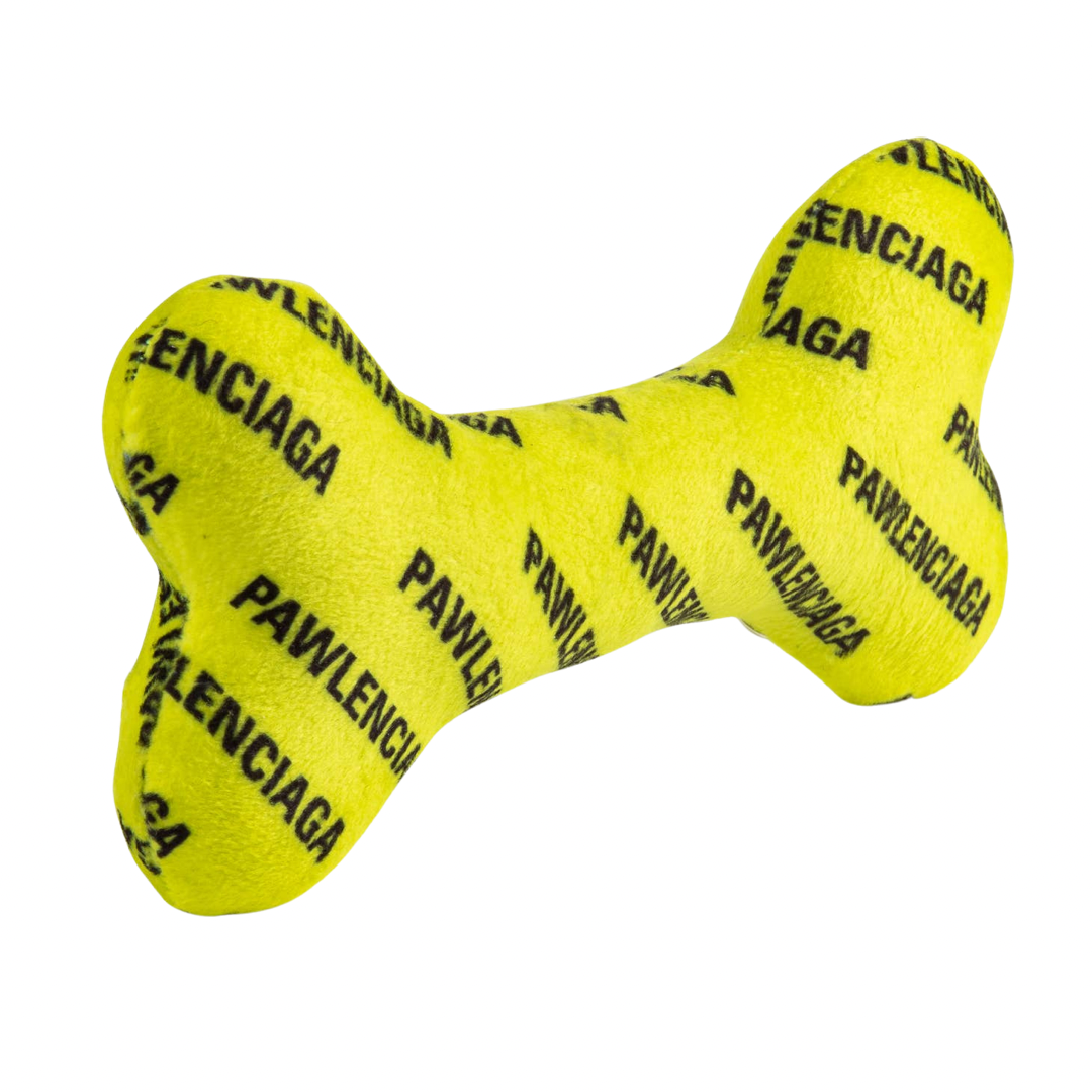 Bright yellow plush dog bone toy with black repeating “Pawlenciaga” text pattern. Soft squeaky designer-style chew toy for pets.