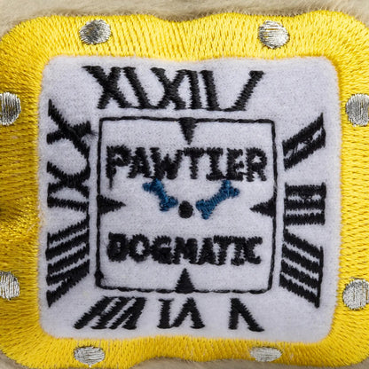 Plush dog toy shaped like a luxury wristwatch with a beige strap, yellow accents, and embroidered watch face details. Soft squeaky designer-style chew toy for pets.
